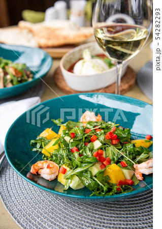 Healthy fruit platter, strawberries raspberries oranges plums apples kiwis grapes blueberries on the 54282293