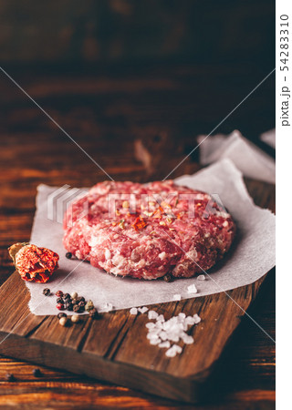 Raw Patty with Spices. Raw Patty with Spices. 54283310