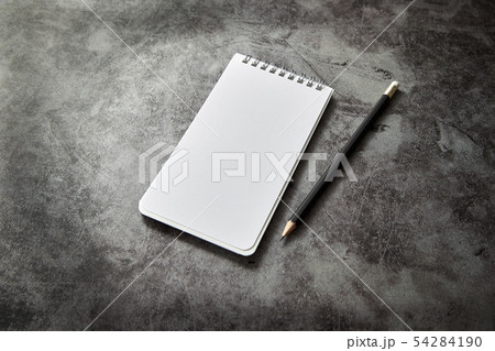 Office desk Blank note book and pencil Office desk Blank note book and pencil 54284190