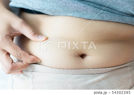 Closeup hand holding abdominal surface woman fat Closeup hand holding abdominal surface woman fat 54302395