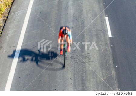Cyclist Road Race Motion Speed Blur Overhead Cyclist Road Race Motion Speed Blur Overhead 54307663