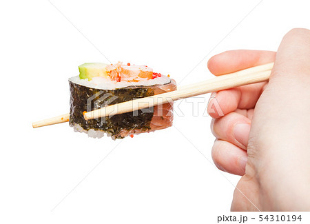 chopsticks holds western-style sushi roll isolated chopsticks holds western-style sushi roll isolated 54310194