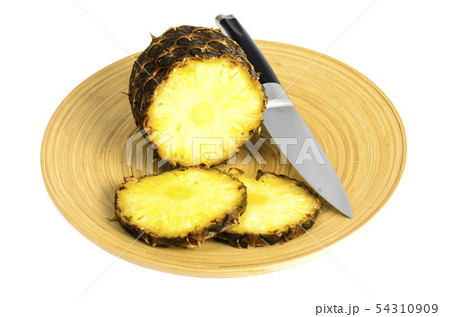 Sliced pineapple on light background 54310909