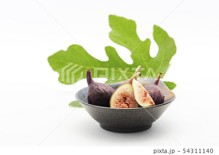 sliced fresh figs on white background sliced fresh figs on white background 54311140