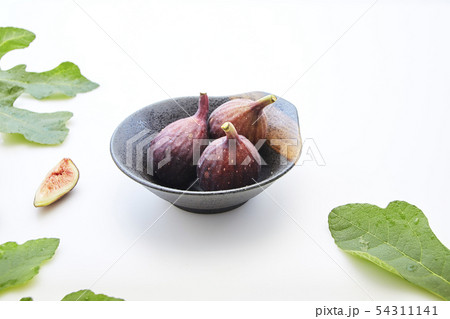sliced fresh figs on white background 54311141