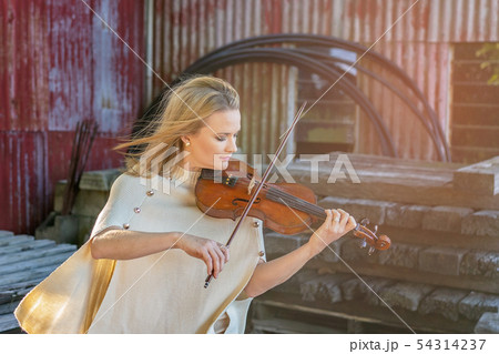 Female Musician Playing 1893 French Antique Violin Female Musician Playing 1893 French Antique Violin 54314237