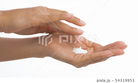 Woman Applying Moisturizing Cream on Hands, White Background Woman Applying Moisturizing Cream on Hands, White Background 54319953