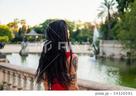 Ladyboy tattooed transgender model in the green park 54320591