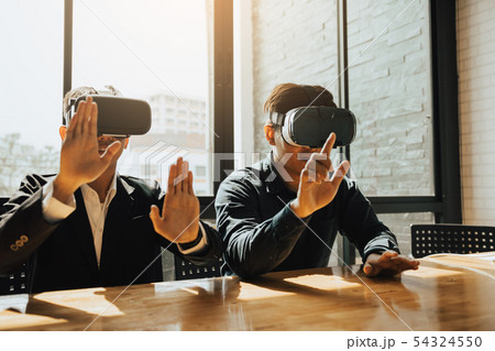 Two business business persons with virtual reality Two business business persons with virtual reality 54324550