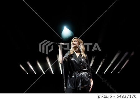 Microphone and female singer close up. Microphone and female singer close up. 54327170
