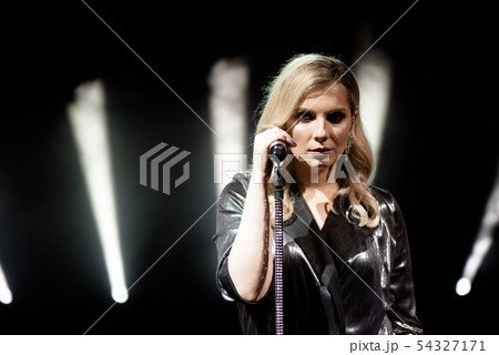 Microphone and female singer close up. Microphone and female singer close up. 54327171