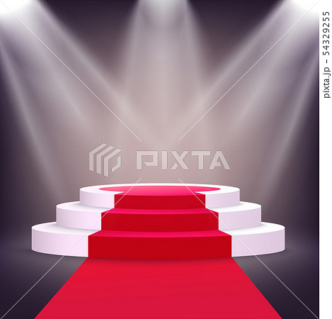 Realistic white podium stage with red carpet lit from multiple spotlights 54329255