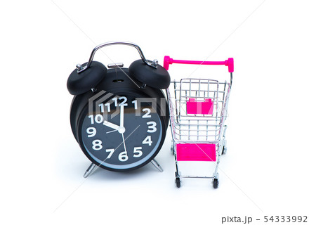 Black alarm clock and shopping cart or supermarket 54333992