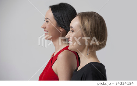 Side portrait - Two confident businesswomen 54334184