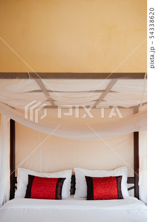 Asian tropical bedroom four poster bed white Asian tropical bedroom four poster bed white 54338620