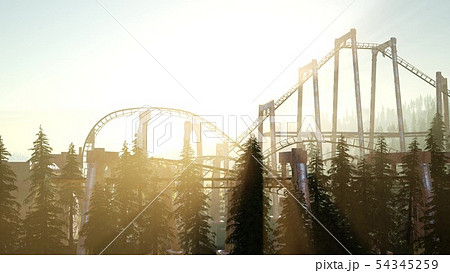 old roller coaster at sunset in forest old roller coaster at sunset in forest 54345259