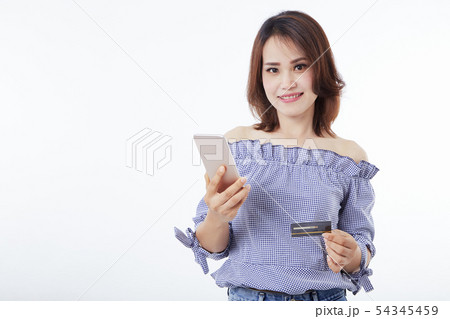 Asian woman holding smartphone and credit 54345459