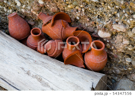Beautiful earthenware jugs and their fragments. 54347556