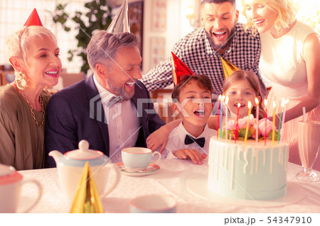 Birthday boy spending birthday with his big happy family 54347910