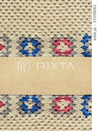 Crochet background and a paper card 54348062