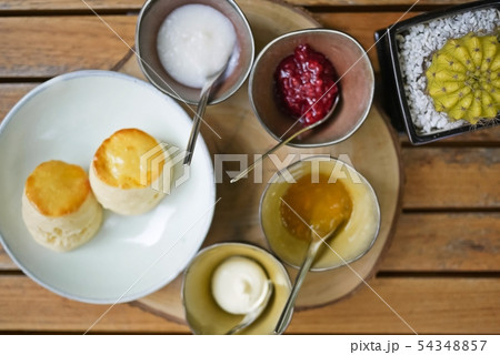 A tasty and delicious set of freshly baked scones 54348857