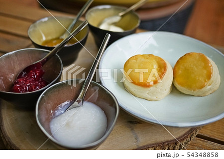 A tasty and delicious set of freshly baked scones A tasty and delicious set of freshly baked scones 54348858