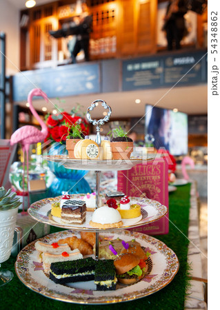 Magical and colorful set of afternoon tea Magical and colorful set of afternoon tea 54348862