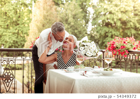 Woman feeling thankful spending evening with husband Woman feeling thankful spending evening with husband 54349372