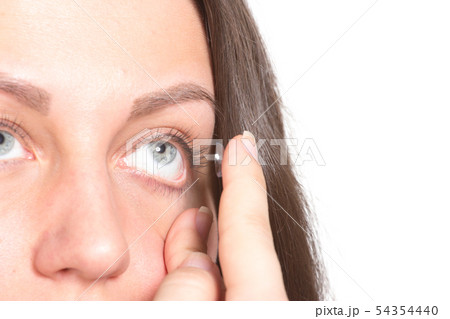 Young woman with contact lenses 54354440