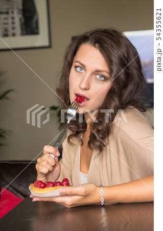 Girl and cake 54355621