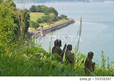 崖にたたずむ石像（原城跡／長崎県南島原市南有馬町乙） 54358387