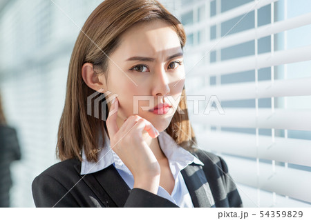 business woman with oily skin 54359829