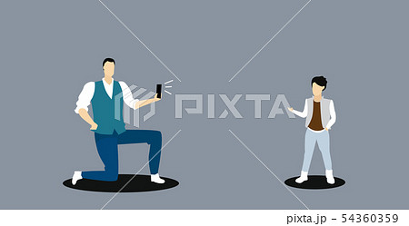 man using smartphone camera father standing on knee taking photo of little boy model fashion shoot 54360359