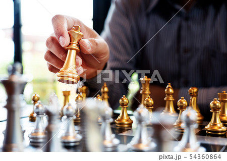 Business man take a king figure checkmate on the 54360864
