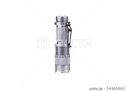Pocket flashlight in a metal case on white 54365091
