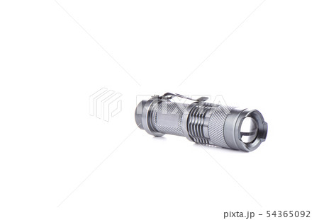 Pocket flashlight in a metal case on white Pocket flashlight in a metal case on white 54365092