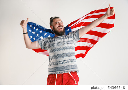 Young man with the flag of United States of America Young man with the flag of United States of America 54366348