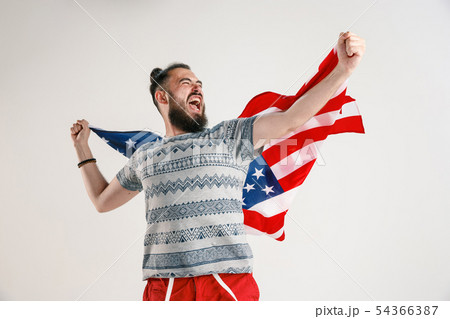Young man with the flag of United States of America 54366387