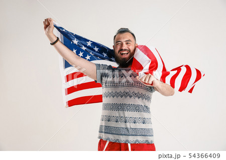 Young man with the flag of United States of America 54366409
