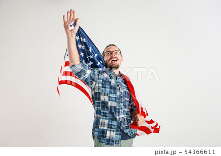 Young man with the flag of United States of America Young man with the flag of United States of America 54366611