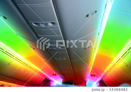 Rainbow light in airplane cabin Rainbow light in airplane cabin 54366983