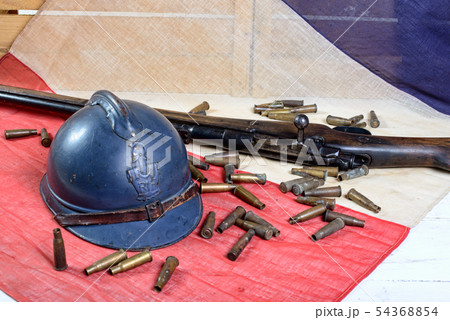 french helmet of the First World War with a gun on 54368854