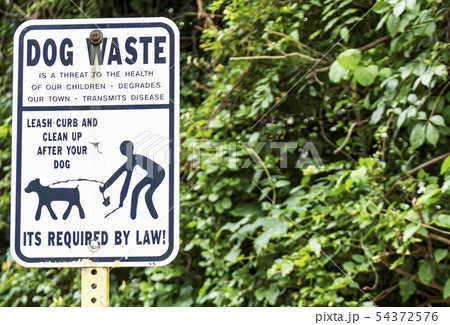 Dlean up after your dog street sign 54372576