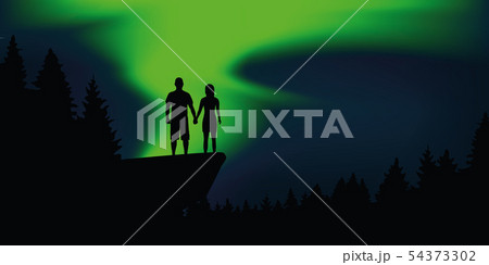 couple in love enjoy the polar lights on a cliff in the forest 54373302
