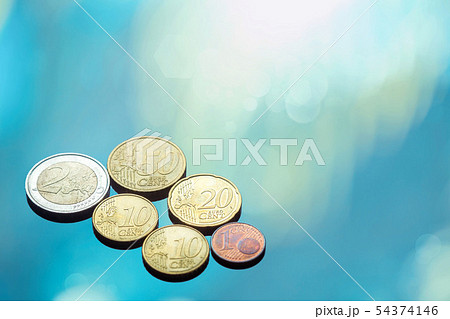 Collection of Euro coins placed on the glass. Collection of Euro coins placed on the glass. 54374146