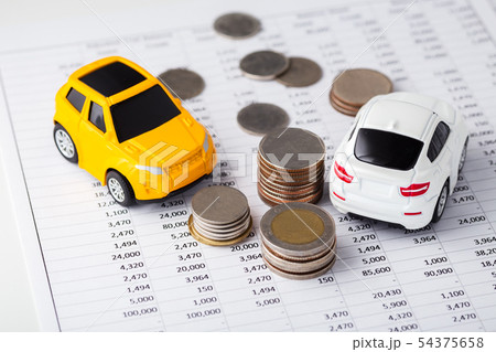 Cars and coins on financial statement Cars and coins on financial statement 54375658