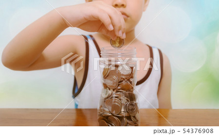 Child collect saving money for the future 54376908
