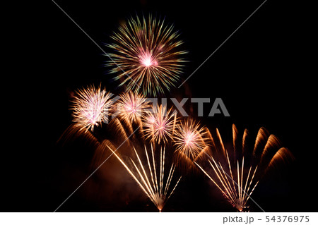 Beautiful colorful fireworks display on the lake. Beautiful colorful fireworks display on the lake. 54376975