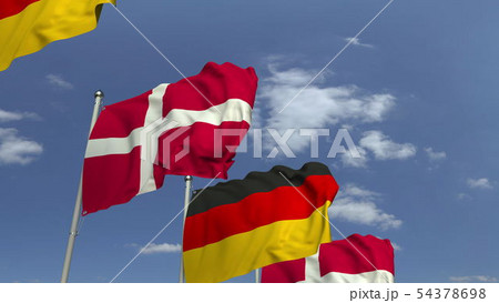 Waving flags of Denmark and Germany on sky background, 3D rendering 54378698