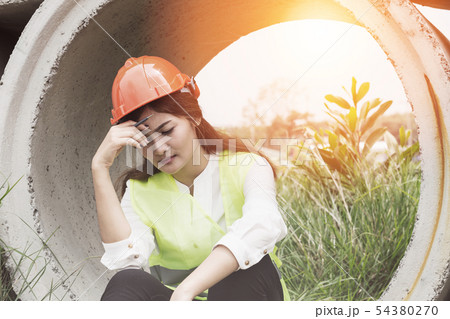 Stressed and tried of engineer Asian woman Stressed and tried of engineer Asian woman 54380270